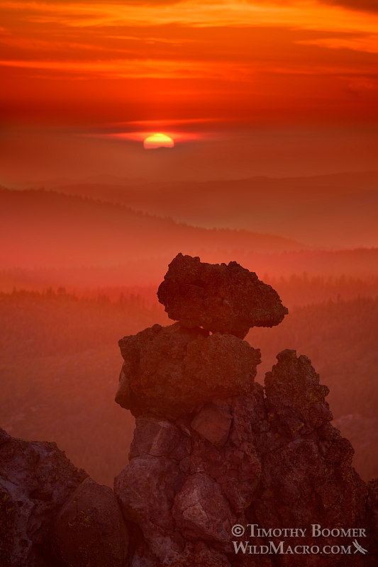The sun sets over volcanic rock formations and rolling mountains near Carson Spur. Eldorado National Forest, El Dorado County, CA. Stock Photo ID=SCE0146 The sun sets over volcanic rock formations and rolling mountains near Carson Spur. Eldorado National Forest, El Dorado County, CA. Stock Photo ID=SCE0146